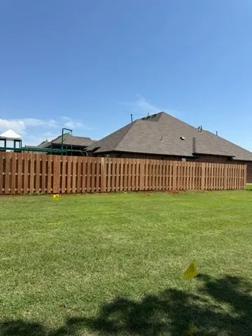 wood shadowbox fence installed by top rail fence