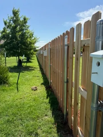 wood shadowbox fence installed by top rail fence