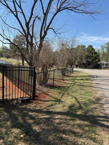 black chain link fence installed by top rail fence