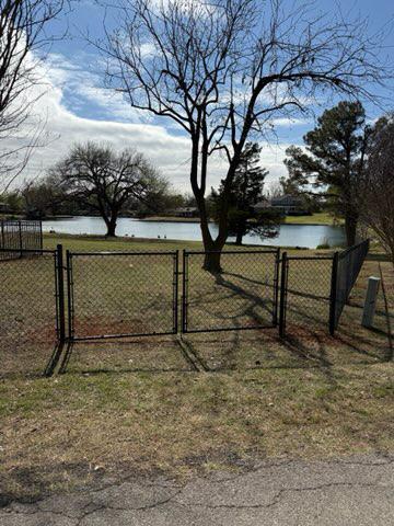 black chain link fence installed by top rail fence