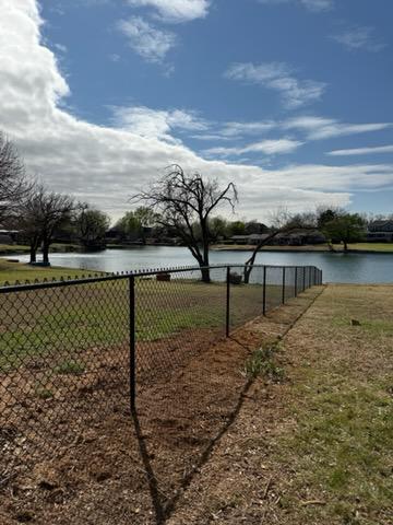 black chain link fence installed by top rail fence