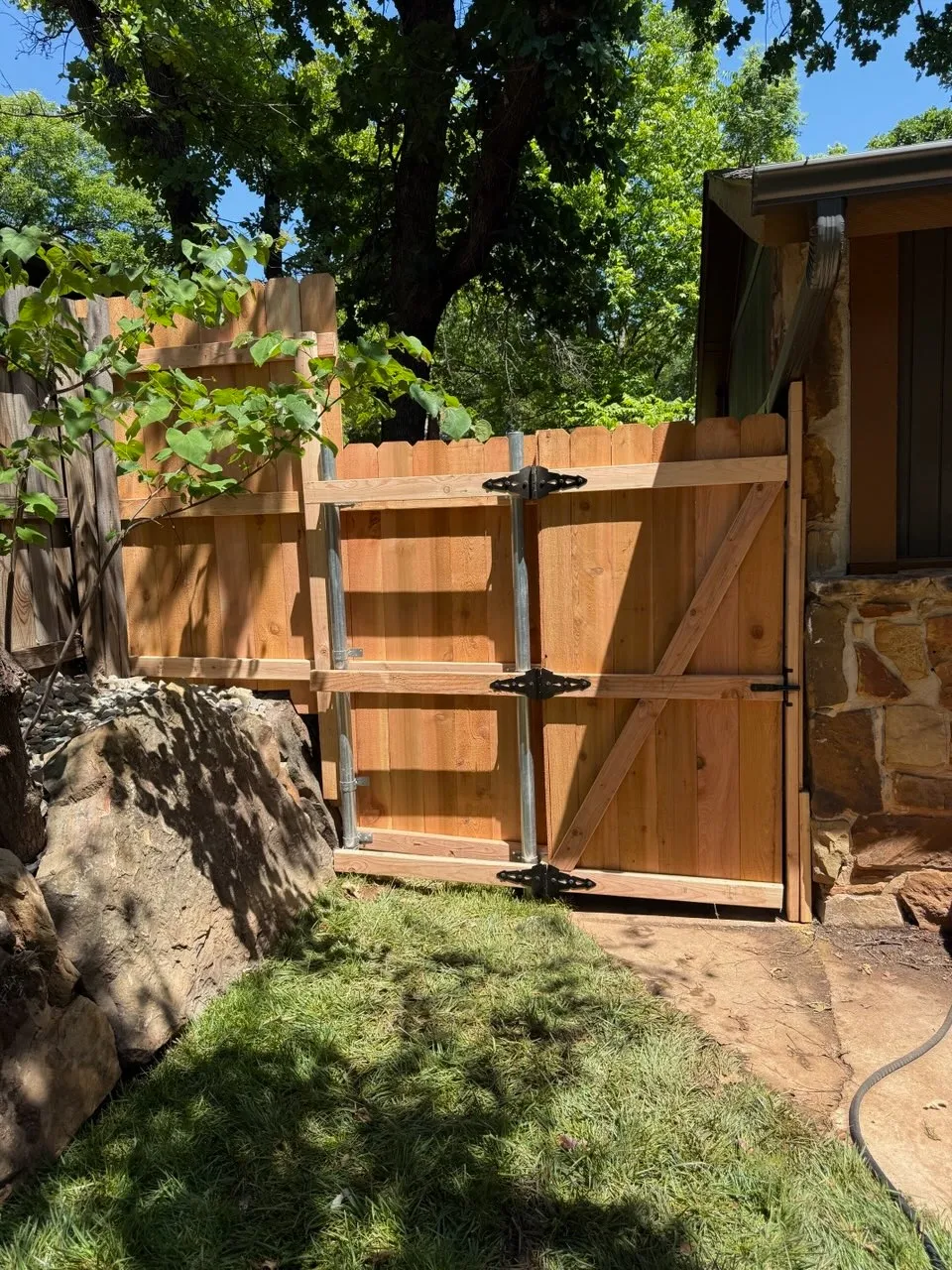 wood privacy fence installed by top rail fence