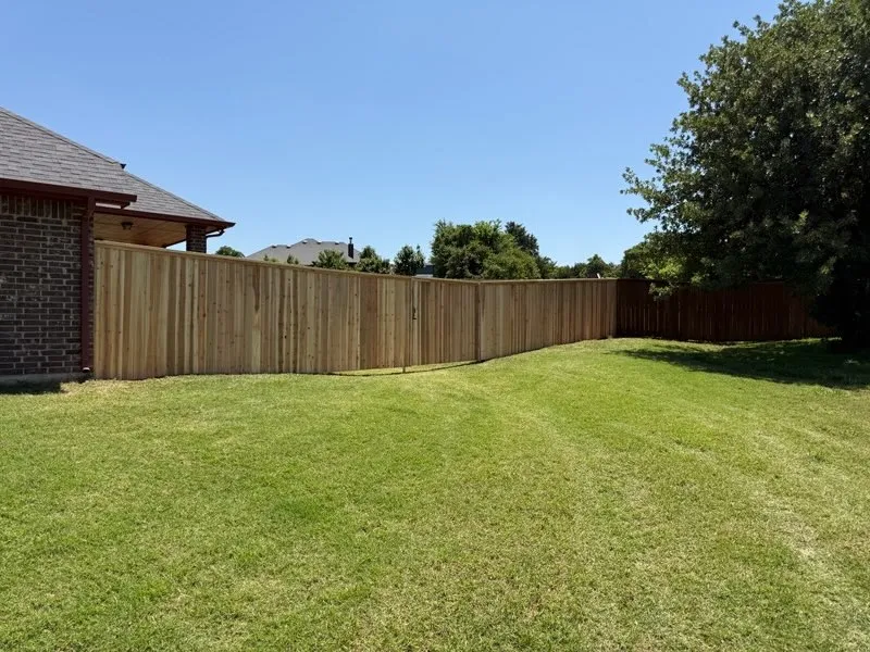 wood privacy fence installed by top rail fence