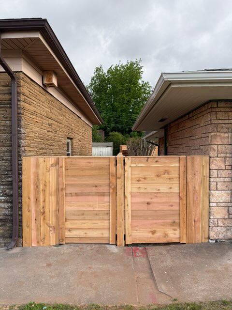 wood horizontal fence installed by top rail fence
