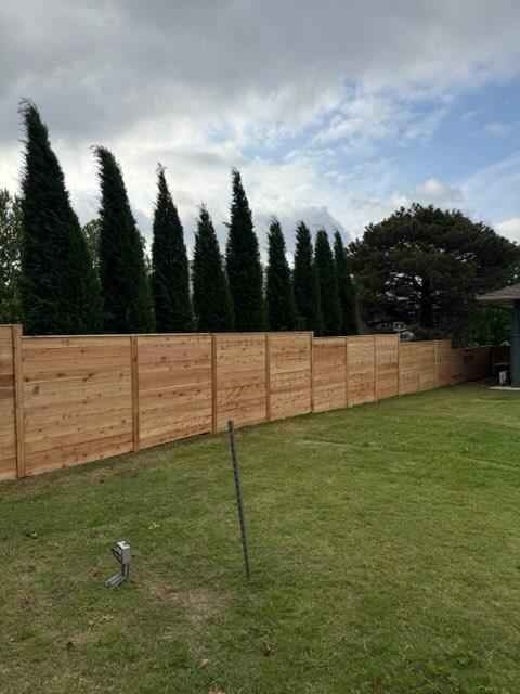 wood horizontal fence installed by top rail fence