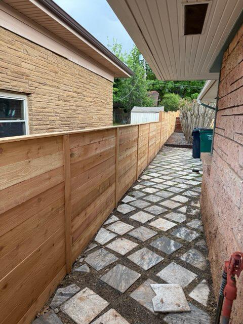 wood horizontal fence installed by top rail fence