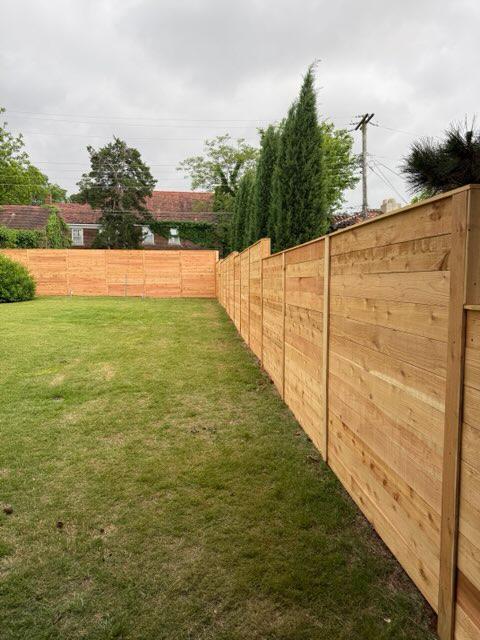wood horizontal fence installed by top rail fence