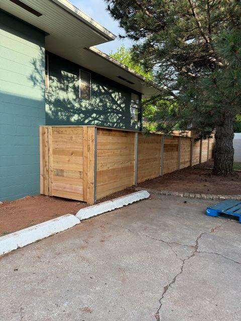 wood horizontal fence installed by top rail fence