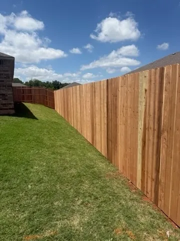 wood privacy fence installed by top rail fence