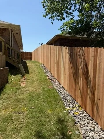 wood privacy fence installed by top rail fence