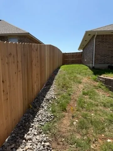 wood privacy fence installed by top rail fence