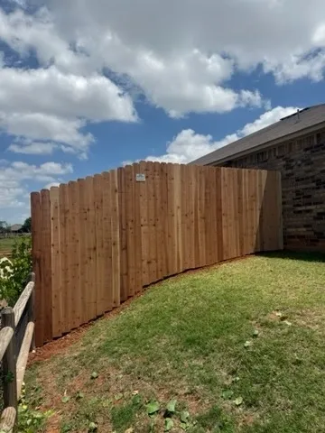 wood privacy fence installed by top rail fence