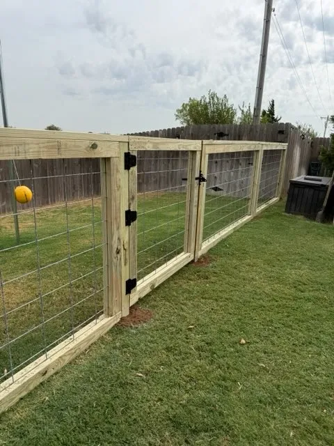 wood ranch rail fence installed by top rail fence