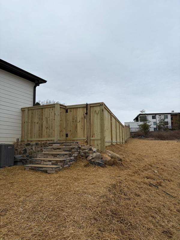 wood cap and trim fence installed by top rail fence