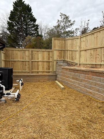 wood cap and trim fence installed by top rail fence