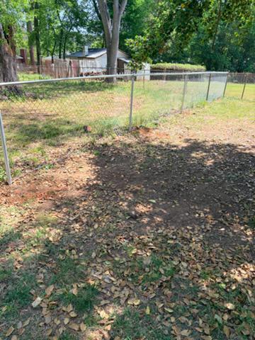 chain link fence installed by top rail fence