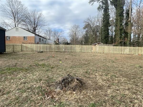 wood picket fence installed by top rail fence