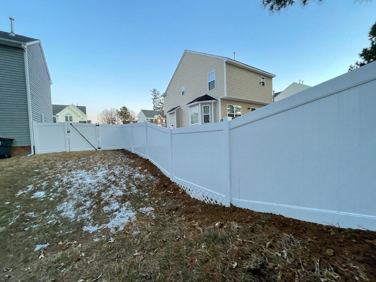 vinyl privacy fence installed by top rail fence