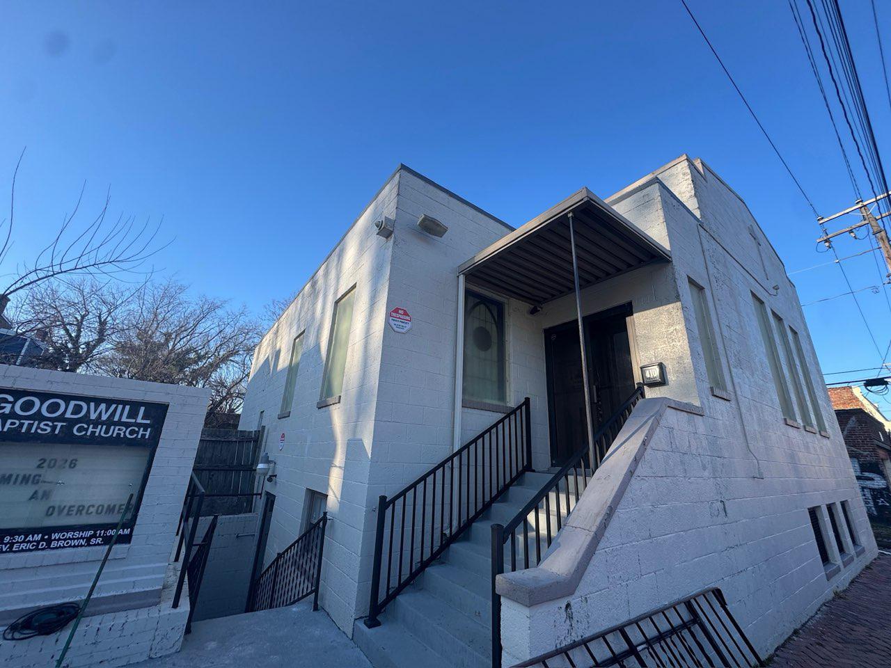 ornamental metal railing installed by top rail fence