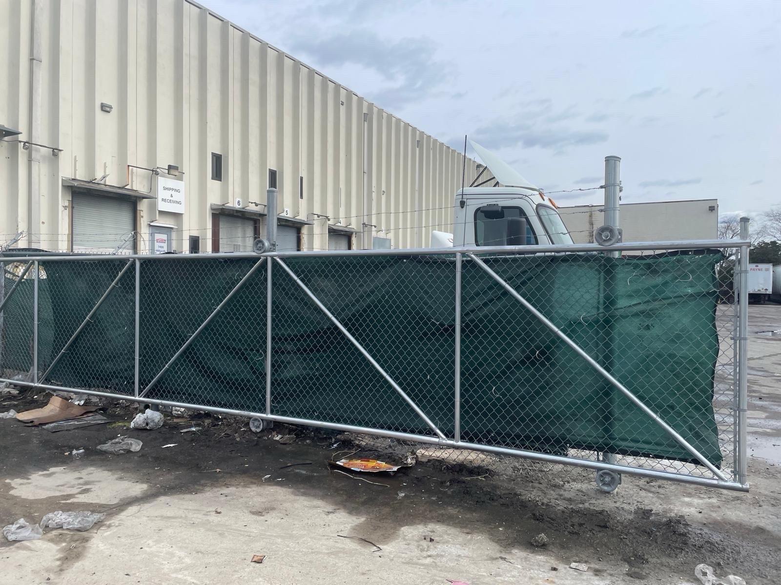 commercial fencing installed by top rail fence