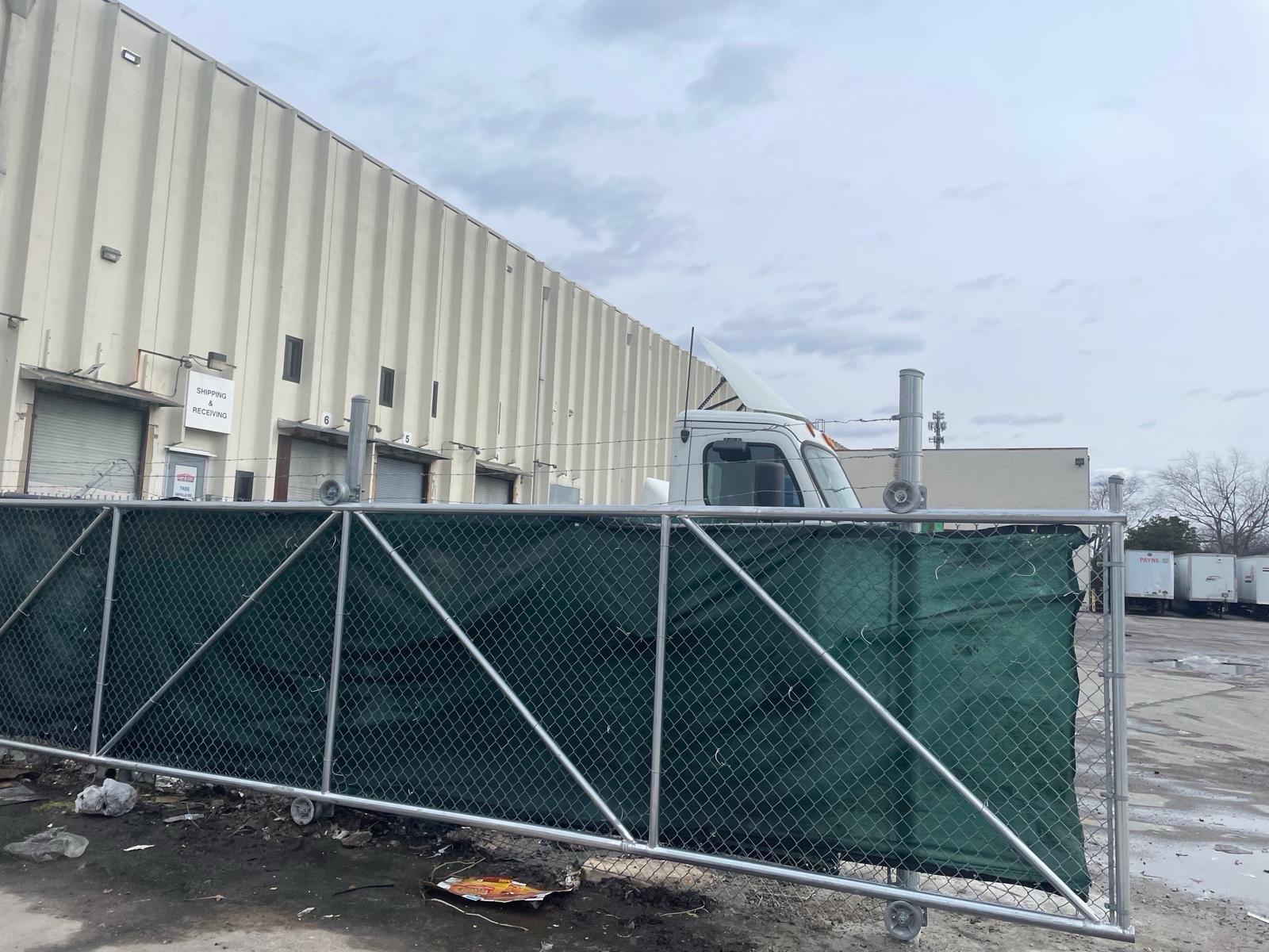 commercial fencing installed by top rail fence