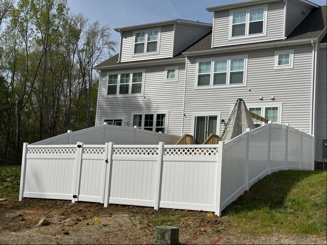 vinyl lattice top fence installed by top rail fence