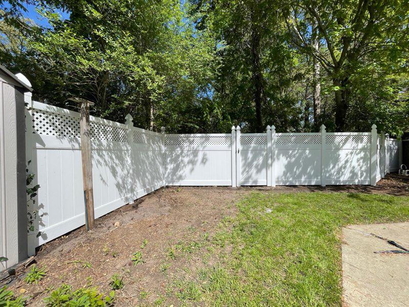 vinyl lattice top fence installed by top rail fence