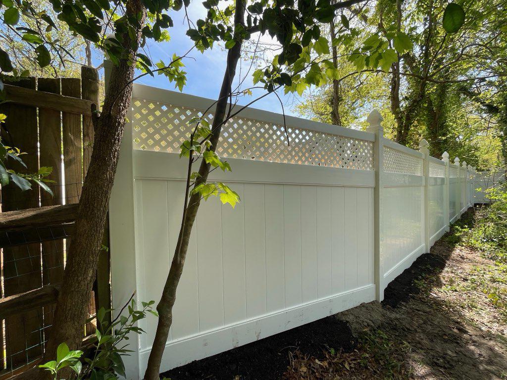 vinyl lattice top fence installed by top rail fence