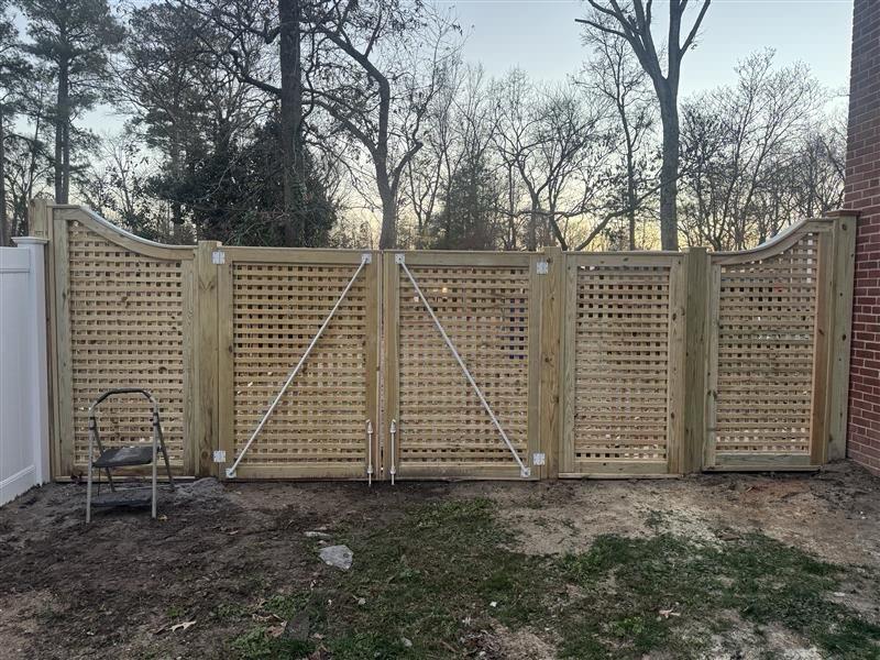 wood gate installed by top rail fence