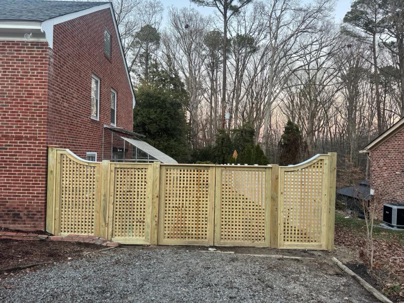 wood gate installed by top rail fence