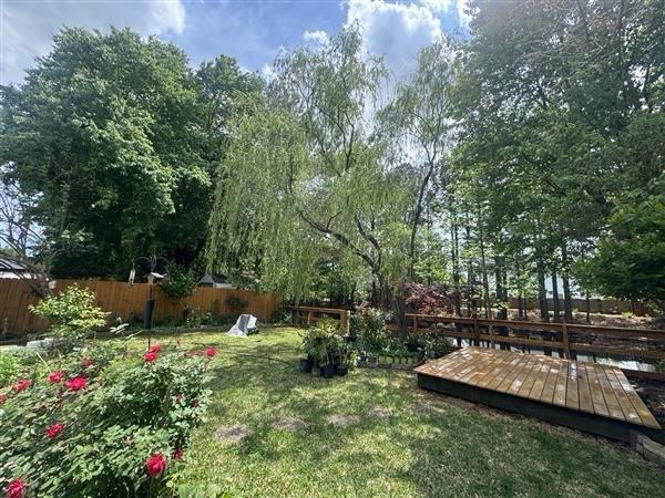 wood fence installed by top rail fence