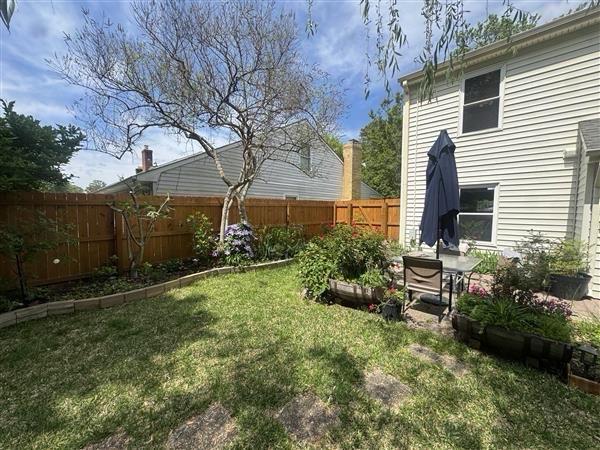wood stockade fence installed by top rail fence