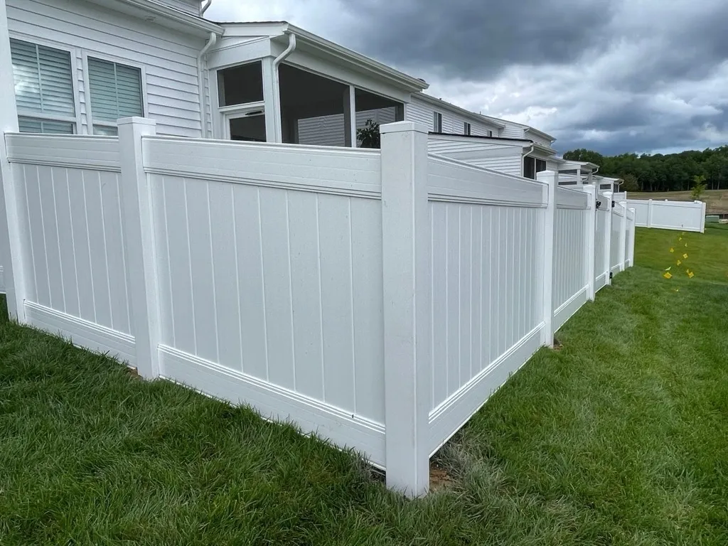 vinyl privacy fence installed by top rail fence