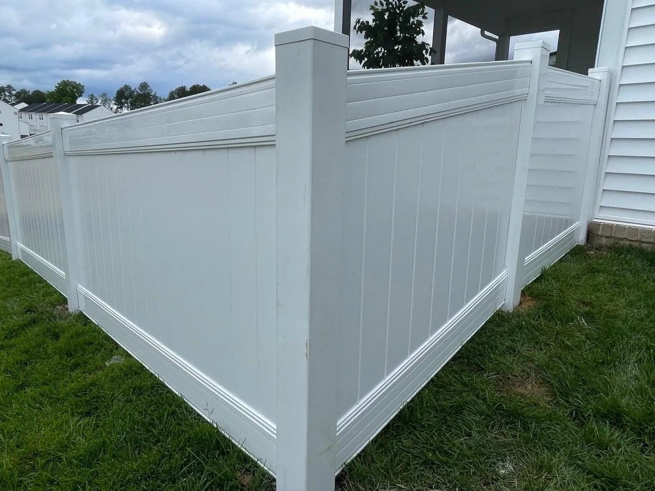 vinyl privacy fence installed by top rail fence