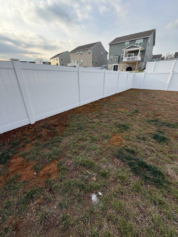 vinyl privacy fence installed by top rail fence