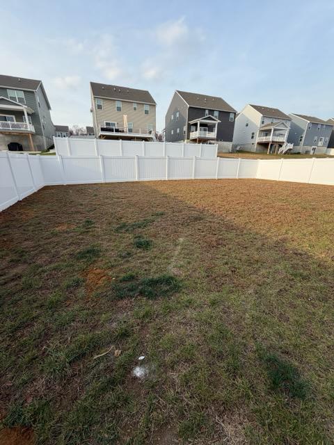 vinyl privacy fence installed by top rail fence