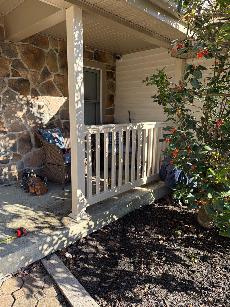 vinyl railing installed by top rail fence