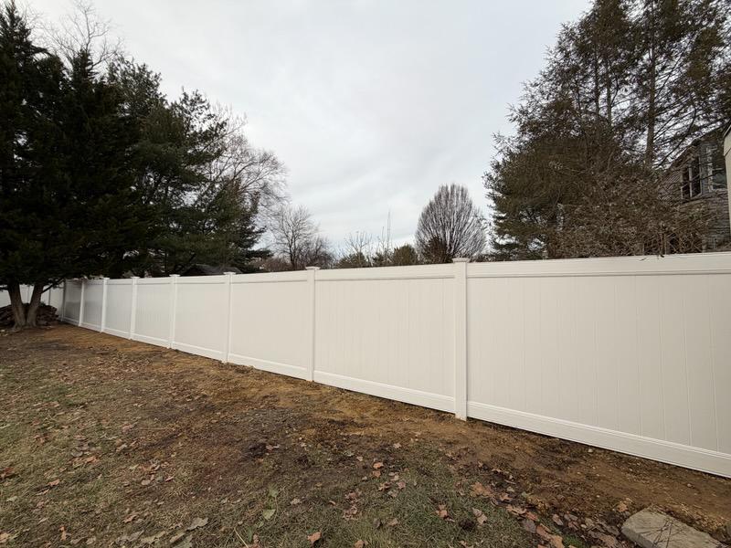 vinyl privacy fence installed by top rail fence