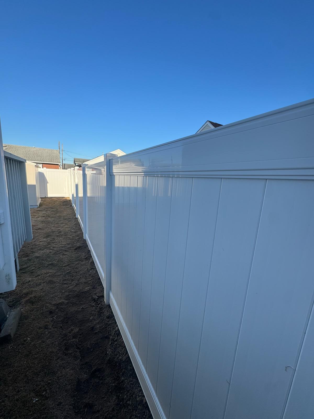 vinyl privacy fence installed by top rail fence