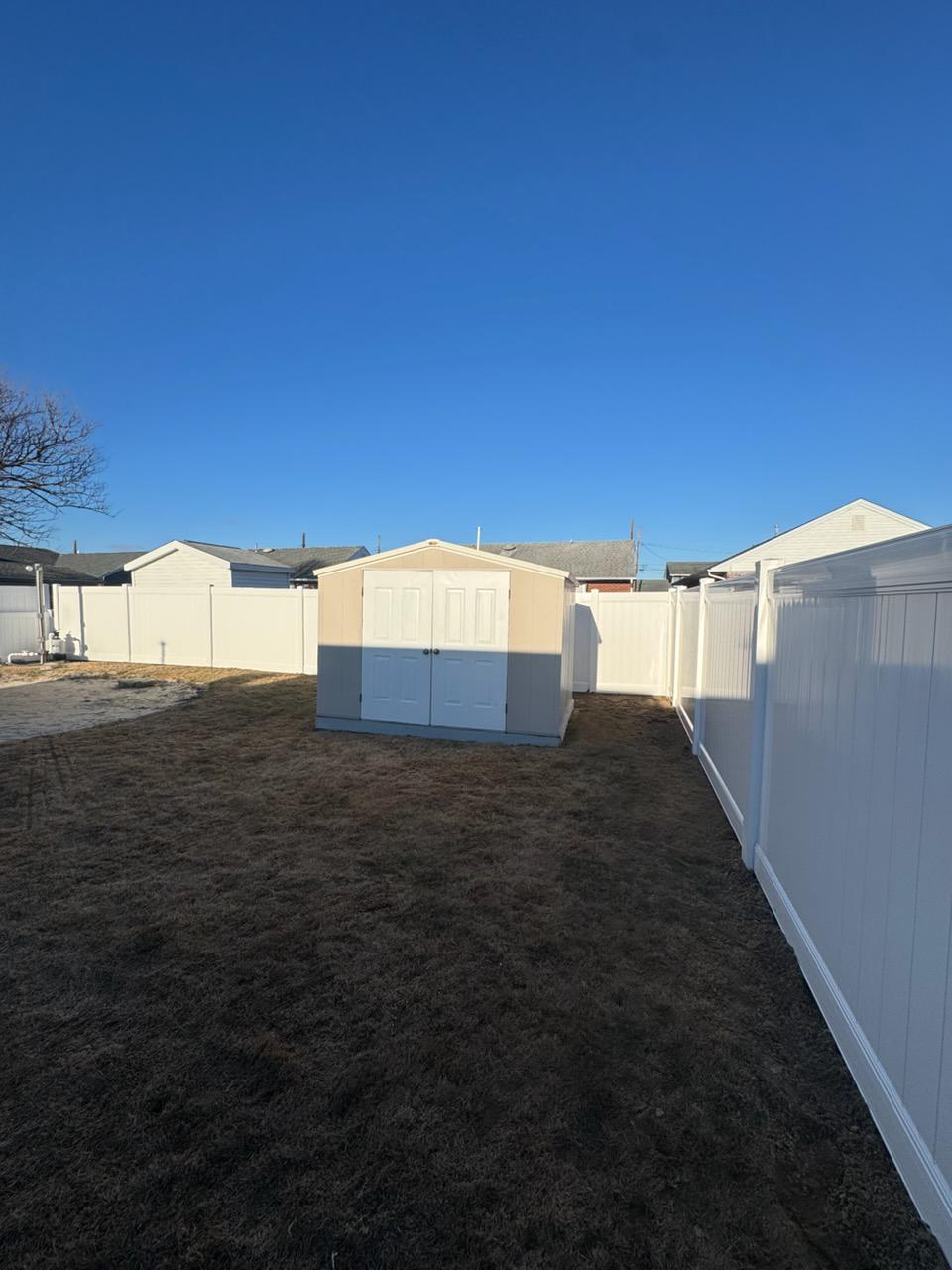 vinyl privacy fence installed by top rail fence