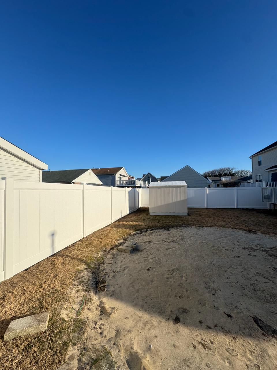 vinyl privacy fence installed by top rail fence