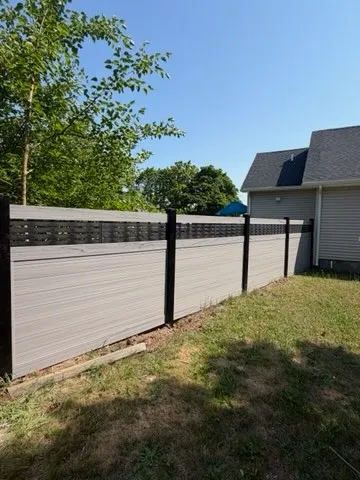 composite fence installed by top rail fence