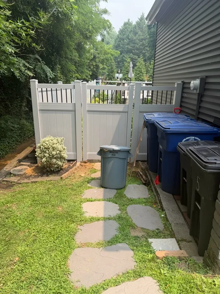vinyl privacy gate installed by top rail fence