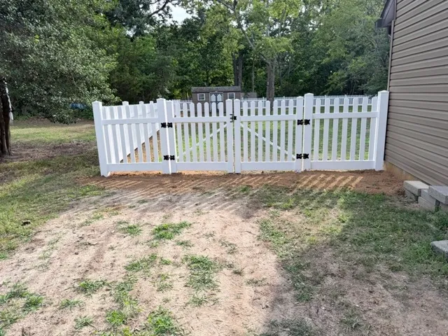 vinyl picket fence installed by top rail fence