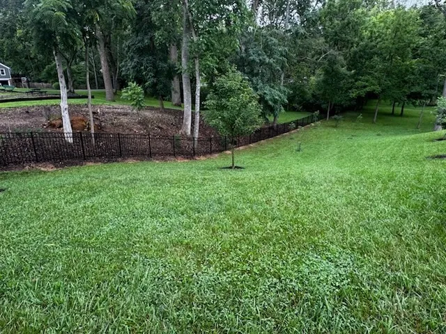 ornamental metal 3 rail fence installed by top rail fence