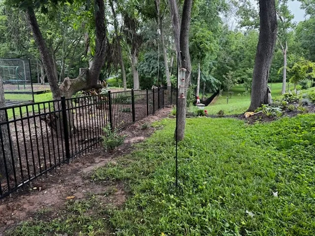 ornamental metal 3 rail fence installed by top rail fence