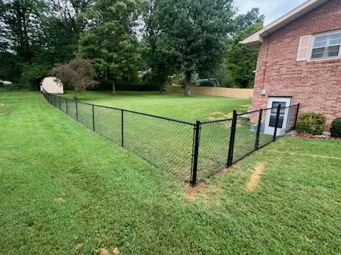 black chain link fence installed by top rail fence