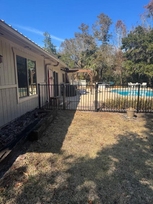  ornamental metal fence installed by top rail fence