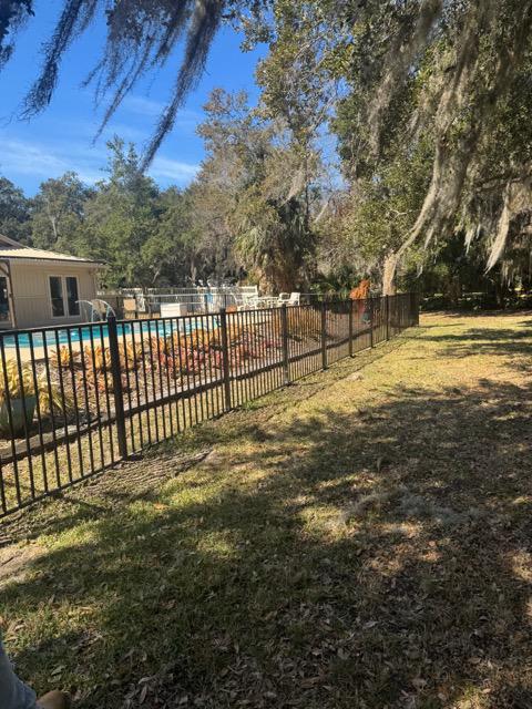  ornamental metal fence installed by top rail fence