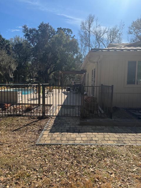  ornamental metal fence installed by top rail fence